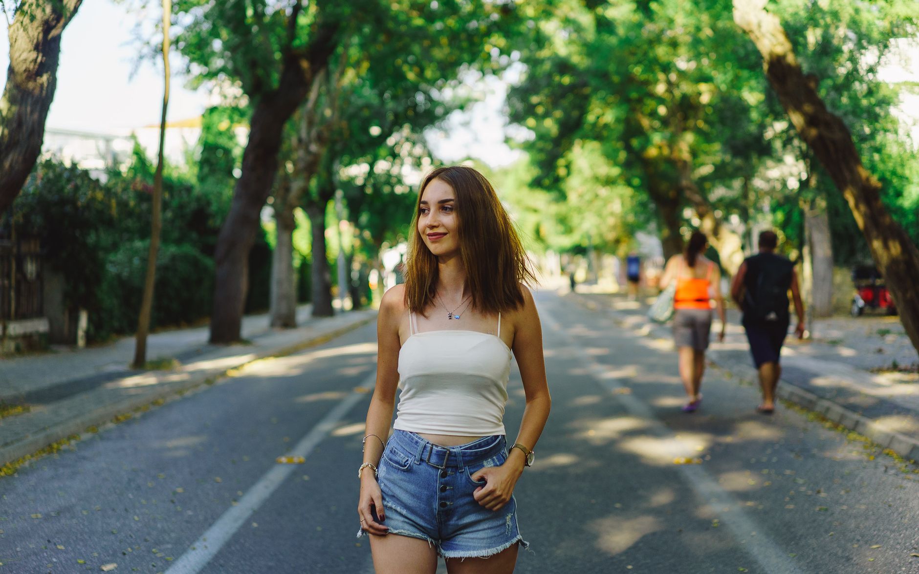 A woman taking a short, easy walk outdoors in the daylight